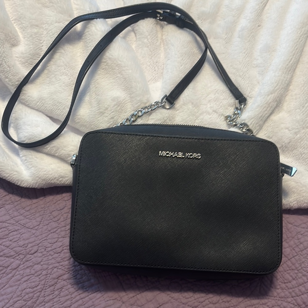 Michael Kors Black Crossbody Bag with Adjustable Strap and Silver Hardware
